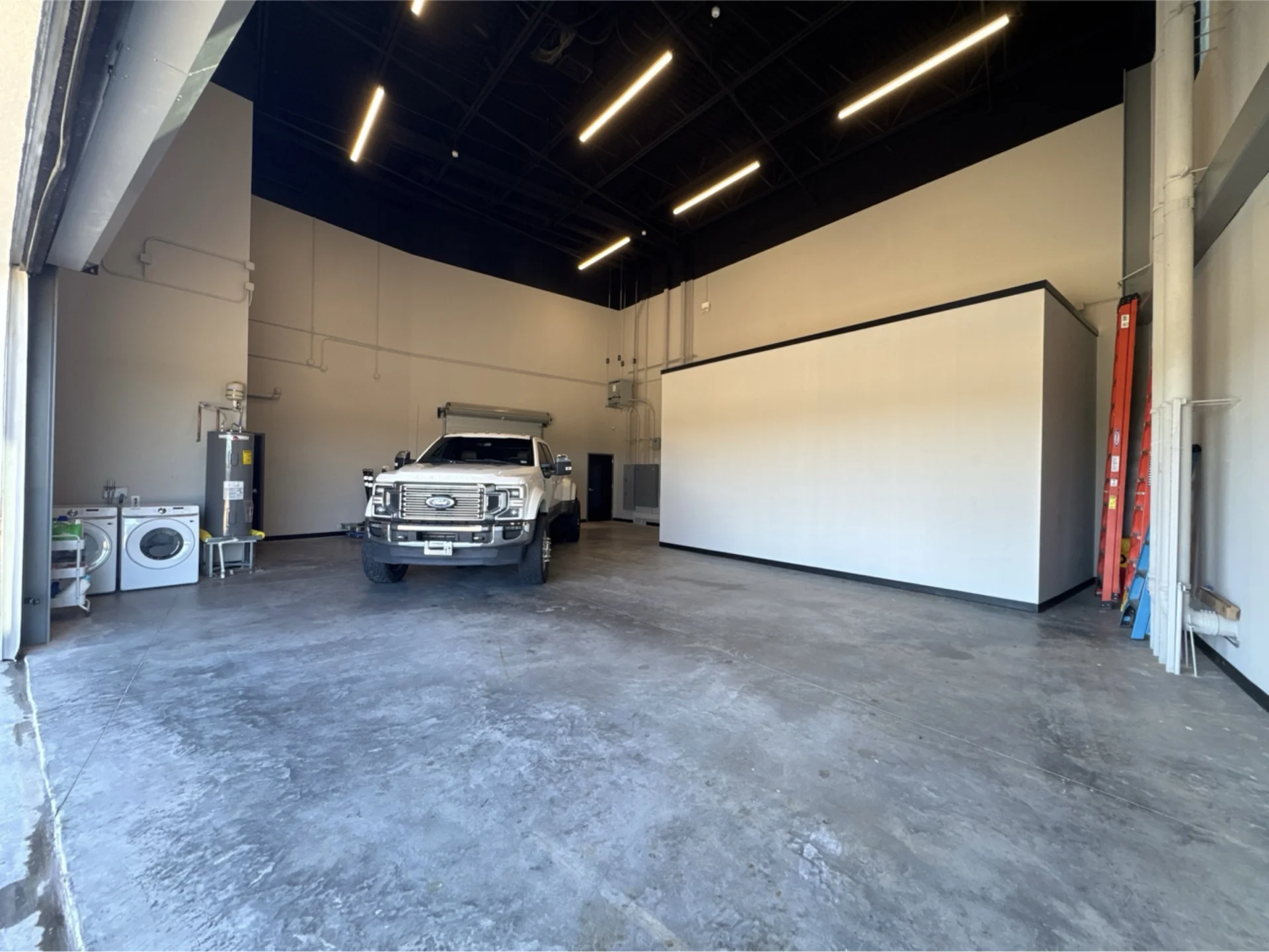 Before: bare concrete floor